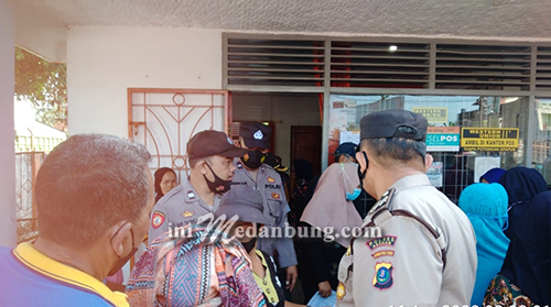 Polsek Pulau Raja Pengamanan Penyaluran Dana BPNT