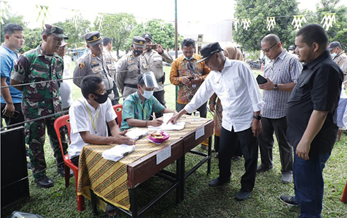 Bupati Asahan Tinjau Pelaksanaan Pilkades di Buntu Pane dan Simpang Empat