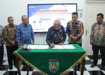 Pemerintah Kabupaten Asahan Lakukan Penandatanganan NPHD dengan KPU Kabupaten Asahan