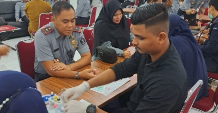 Imigrasi Kelas II TPI Belawan Menggelar Bhakti Sosial