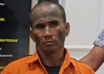 Pria Berwajah Seram dan Tubuh Dipenuhi Tato Digari Polisi