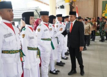 Pj. Bupati Langkat Faisal Hasrimy Kukuhkan 58 Anggota Paskibraka: Ini Tugas Mulia pada HUT ke-79 RI 