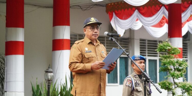 Pj Bupati Langkat Tekankan Pentingnya Tindak Lanjut Pengawasan untuk Raih Opini WTP di Apel Gabungan ASN