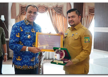 Pj Bupati Langkat Beri Penghargaan SAKIP dan Pelayanan Publik Terbaik: Dorong Peningkatan Kinerja dan Inovasi