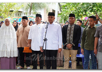 Pj Bupati Langkat Faisal Hasrimy Pimpin Upacara Pelepasan Jenazah Kades Serapuh ABC