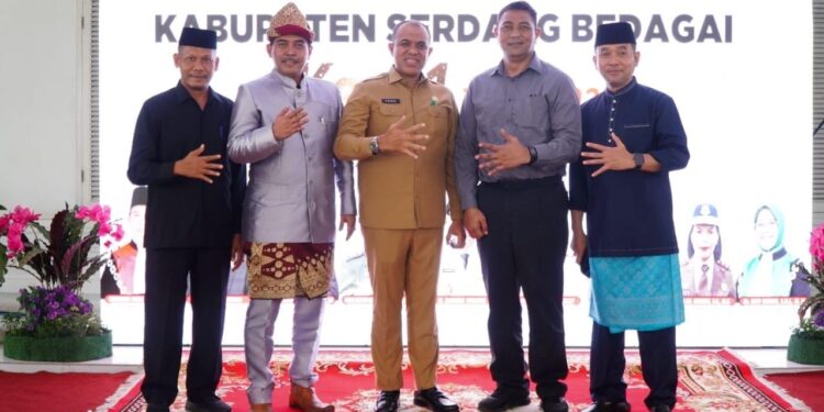 Pj Bupati Langkat Hadiri HUT ke-21 Sergai: Semangat Kolaborasi untuk Kemajuan Bersama