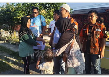 PAC PP Belawan Bagikan Takjil Kepengguna Jalan dan Masyarakat